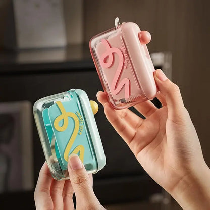 Travel-sized storage case - features an automatic pop-up dispenser