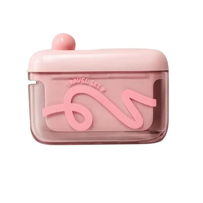 Travel-sized storage case - features an automatic pop-up dispenser